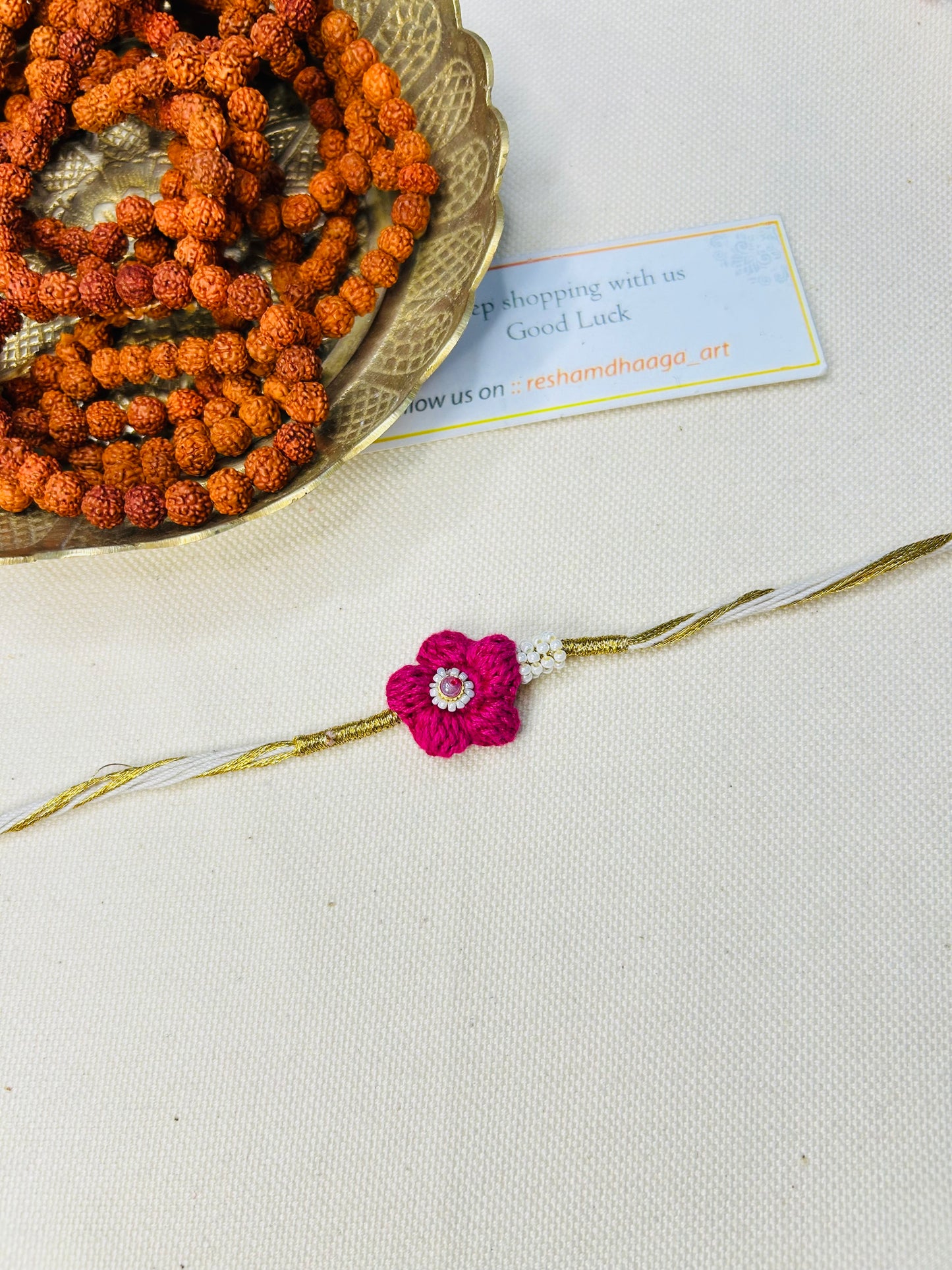 Flower with beads crochet rakhi