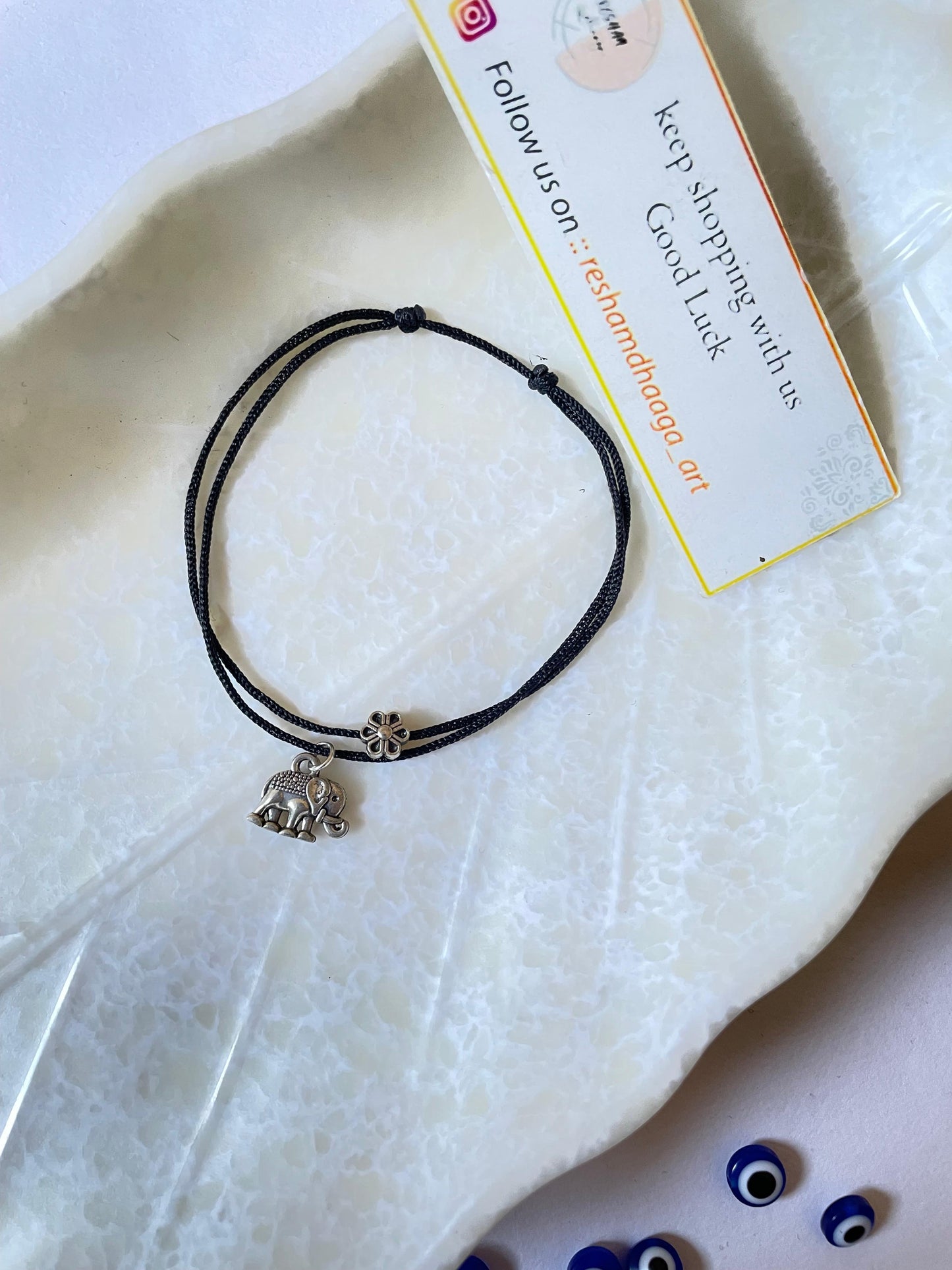 Hanging Elephant with flower Ankelt