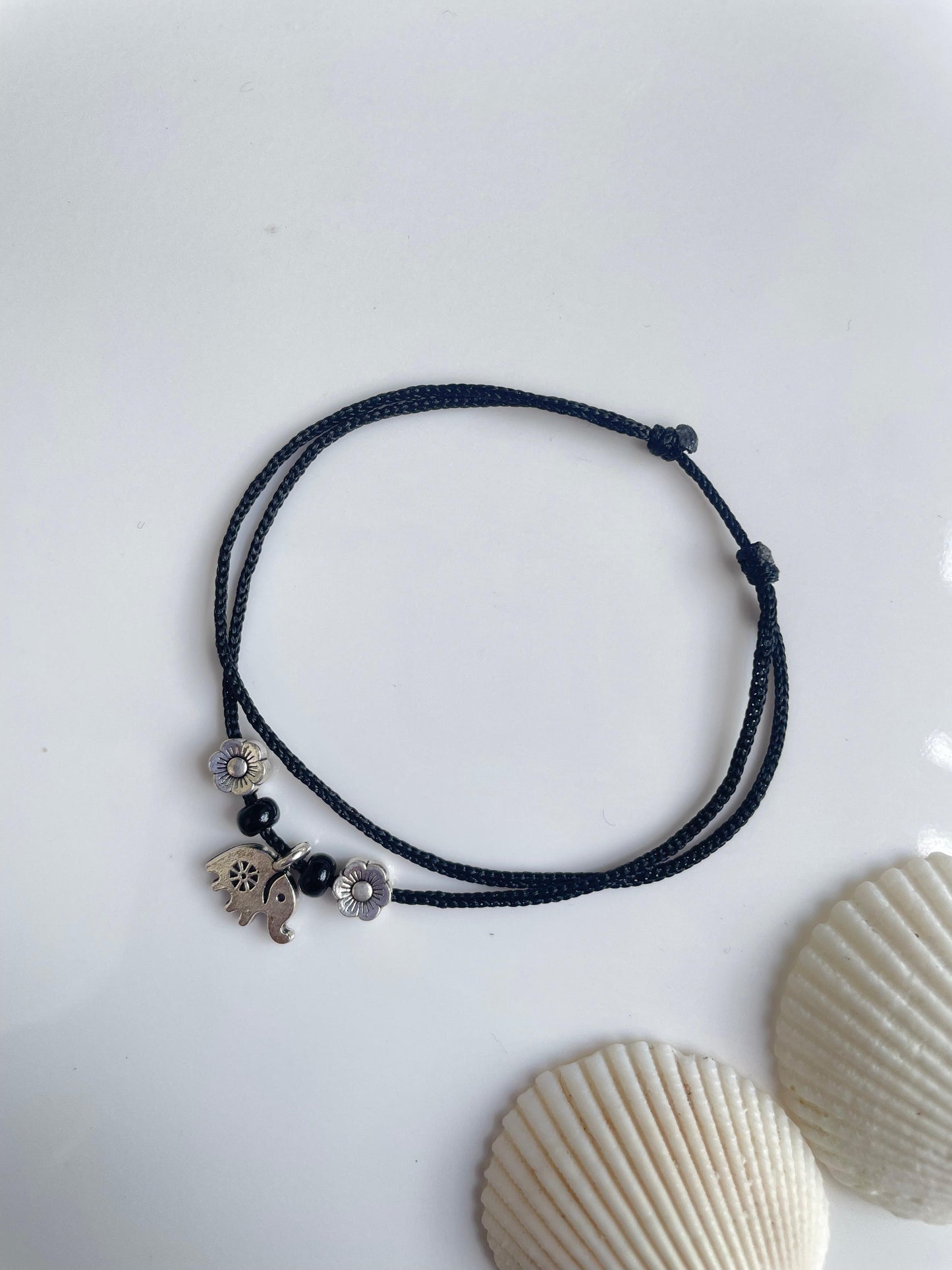 Hanging elephant with flowers and beads anklet