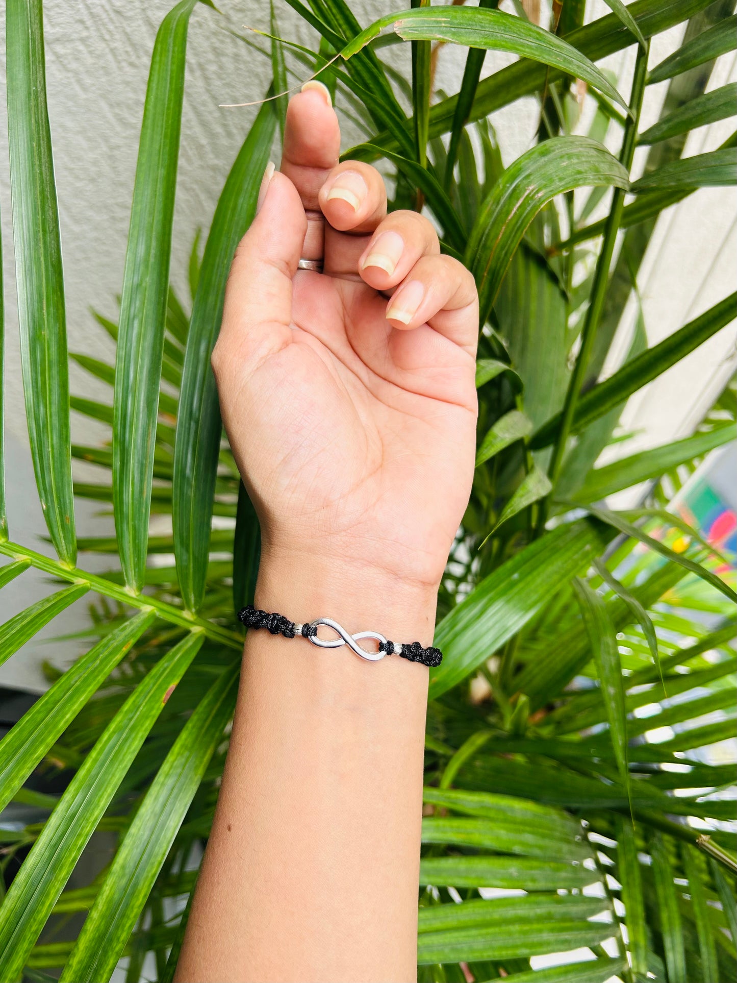 Infinity with beads black unisex bracelet