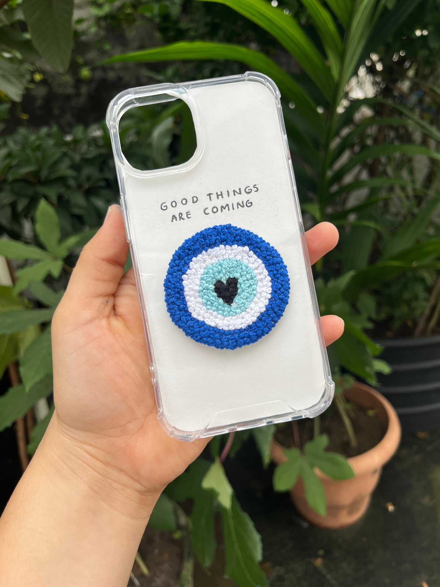 Thread evil-eye phone case