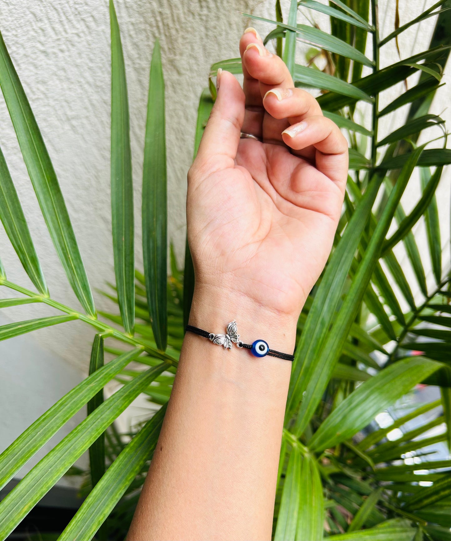 Butterfly with evileye bracelet